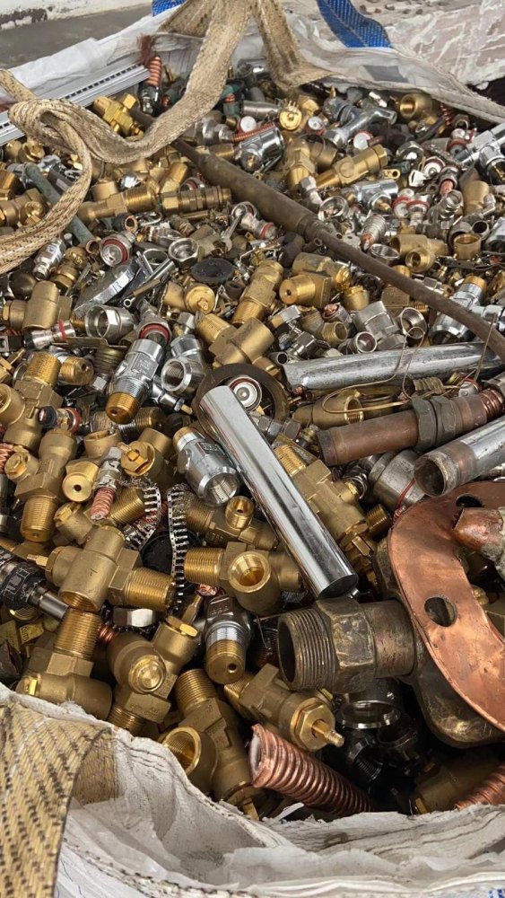 Brass valves, fittings and taps bagged by grade for recycling at the Ogoo Recycle yard