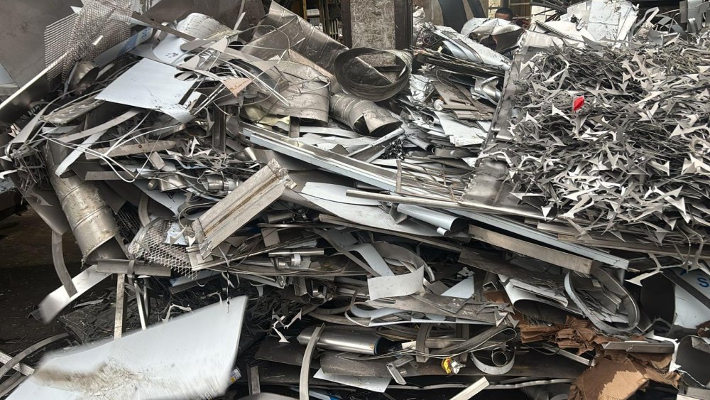 Stainless steel sheet offcuts and trimmings sorted for recycling